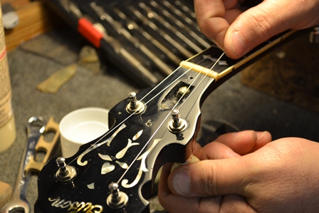 Banjo headstock during setup and action work